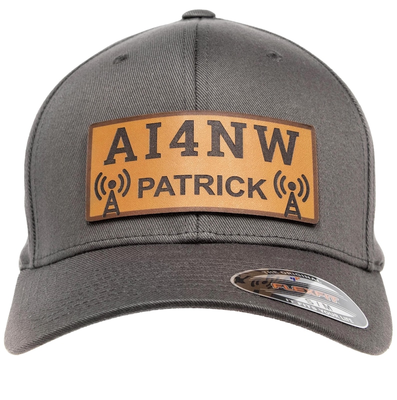 Gray Flexfit cap with personalized leather AI4NW call sign patch